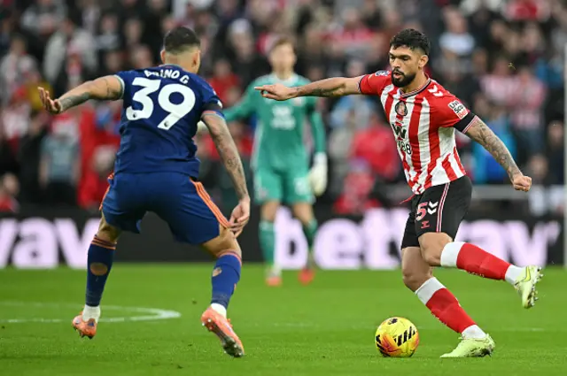 Bruno Guimaraes (L) challenges Sunderland's Paraguayan defender Omar Alderete