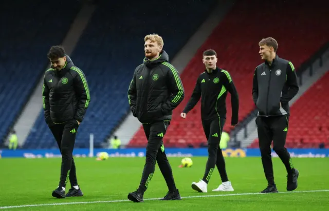 Celtic players out on the Hampden turf