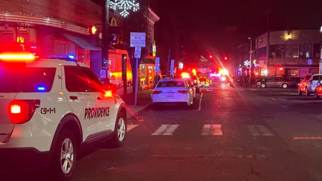 A police vehicle stands near the site of a mass shooting reported by authorities at Brown University in Providence, Rhode Island