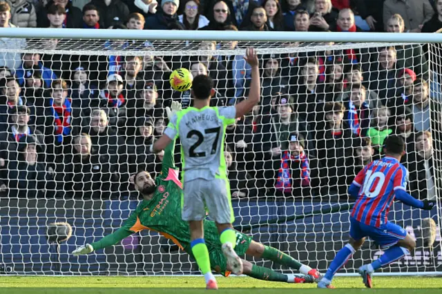 Yeremy Pino (R) shoots over the bar