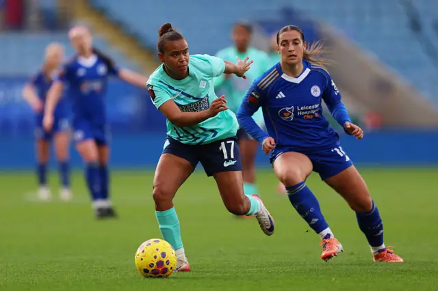Julie Thibaud of Leicester City battles for possession with Nikita Parris of London City Lionesses