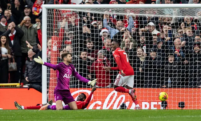 Tottenham Hotspurs' goalkeeper Guglielmo Vicario protests as Nottingham Forest's Callum Hudson-Odoi celebrates