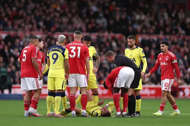 Xavi Simons of Tottenham Hotspur goes down with an injury