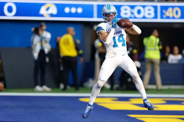 Amon-Ra St Brown scores a touchdown