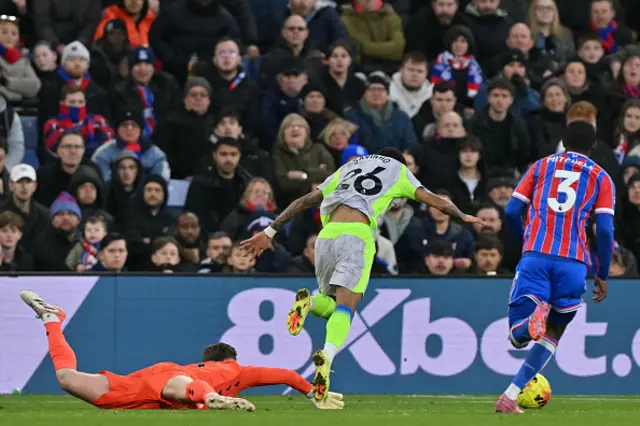 Savinho is brought down by Crystal Palace goalkeeper Dean Henderson