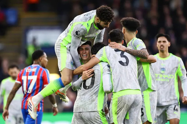 Phil Foden of Manchester City celebrates their second goal with Ruben Dias