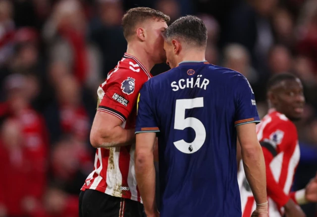 Sunderland's Daniel Ballard clashes with Newcastle United's Fabian Schar