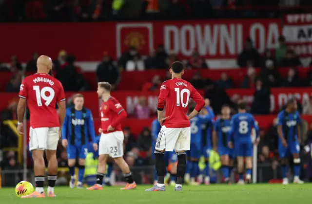 Matheus Cunha of Manchester United reacts after conceding the 2-2 goal
