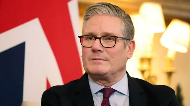 Keir Starmer in a suit and tie.