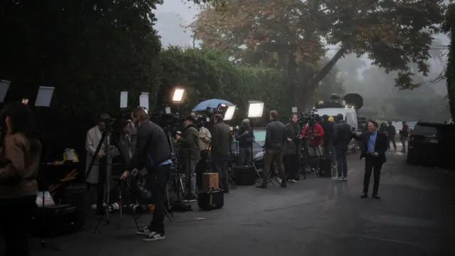 Members of the media work outside the Reiner household, where actor-director and political activist Rob Reiner and his wife were found dead, in Los Angeles, California, U.S. December 15, 2025.
