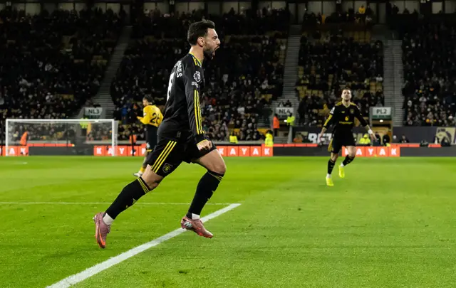 Manchester United's Bruno Fernandes celebrates scoring his side's first goal during the Premier League match between Wolverhampton Wanderers and Manchester United at Molineux on December 8, 2025 in Wolverhampton, England.