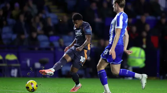 Rhian Brewster has a shot
