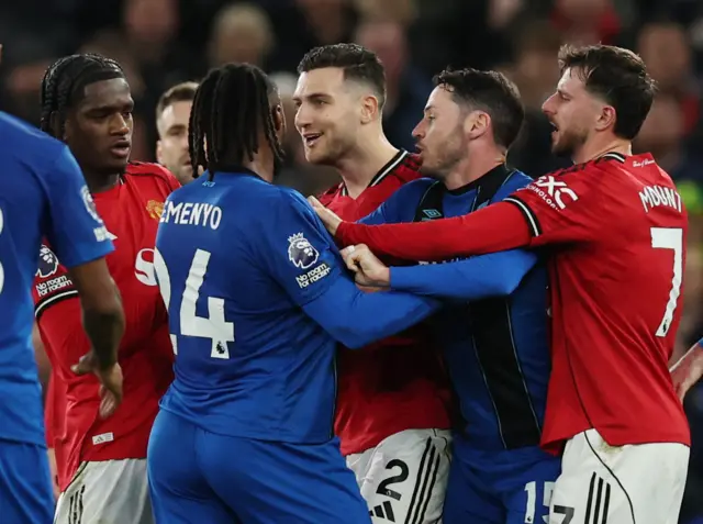 AFC Bournemouth's Antoine Semenyo clashes with Manchester United's Diogo Dalot