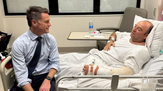 New South Wales Premier Chris Minns visits Ahmed al Ahmed in hospital.