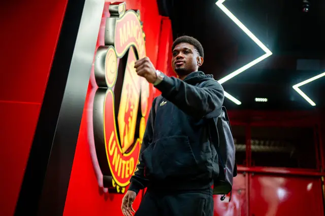 Amad of Manchester United arrives ahead of the Premier League match between Manchester United and Bournemouth at Old Trafford on December 15, 2025 in Manchester, England.