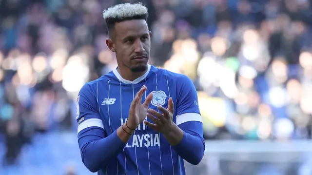 Callum Robinson applauds