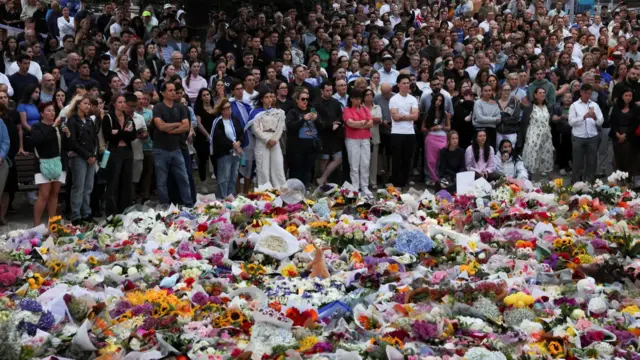 Mourners at the Bondi Pavilion earlier on Monday