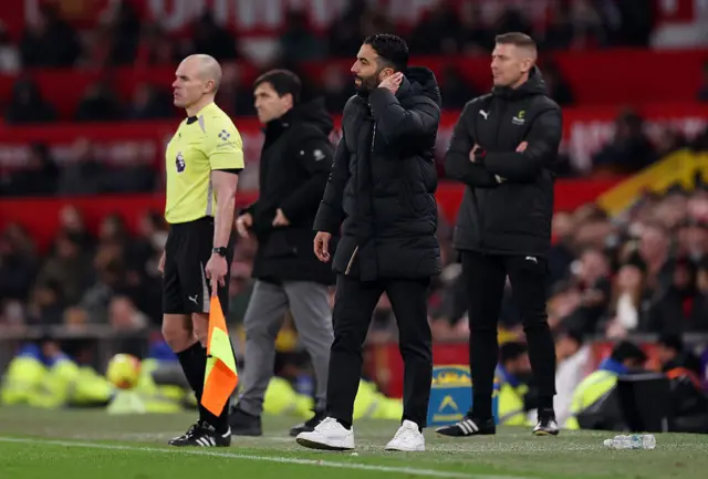 Ruben Amorim, Manager of Manchester United, looks on