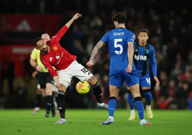 AFC Bournemouth's Marcos Senesi in action with Manchester United's Matheus Cunha