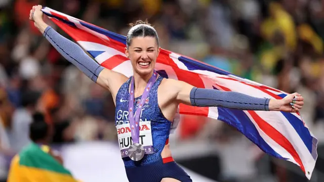 Amy Hunt celebrates winning world 200m silver