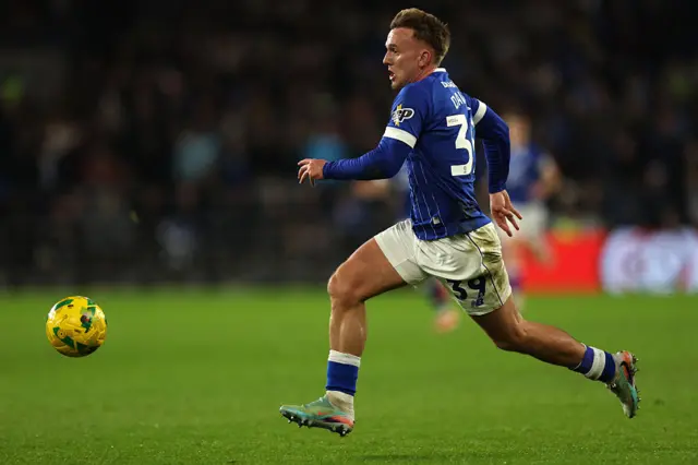 Isaak Davies runs in on goal during the English League Cup quarter-final football match between Cardiff City and Chelsea at Cardiff City Stadium.
