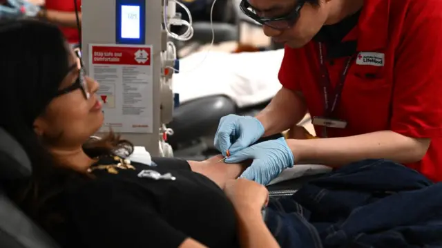 Woman seen donating blood