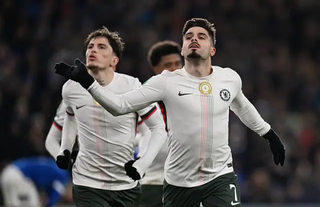 Pedro Neto of Chelsea celebrates scoring his team's second goal during the Carabao Cup Quarter Final match between Cardiff City and Chelsea at Cardiff City Stadium on December 16.