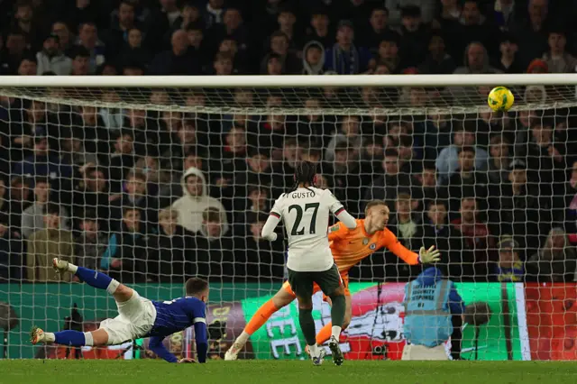 David Turnbull heads home their first goal during the English League Cup quarter-final football match between Cardiff City and Chelsea at Cardiff City Stadium, in Cardiff, south Wales on December 16.
