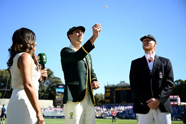 Australia captain Pat Cummins tosses the coin alongside England captain Ben Stokes