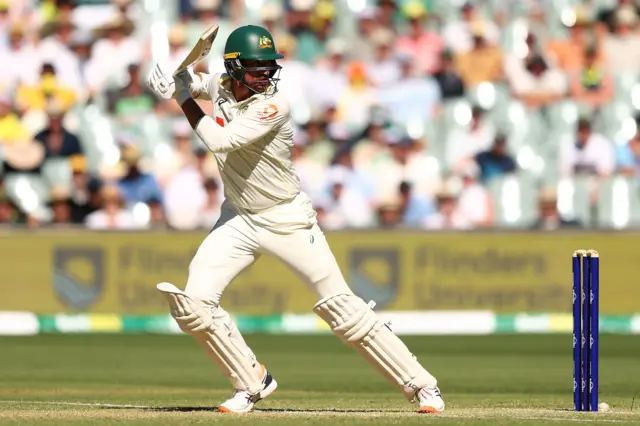 Mitchell Starc plays a shot