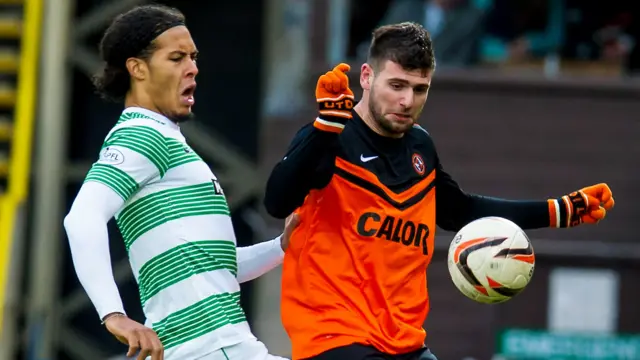 Celtic's Virgil Van Dijk (left) and Nadir Ciftci battle for possession.