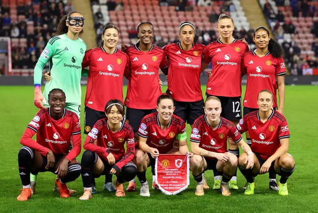 Players of Manchester United pose for a team photograph prior to the UEFA Women's Champions League 2025/26 league phase match between Manchester United Women and OL Lyonnes at Progress with Unity Stadium on December 10, 2025 in Leigh, England.