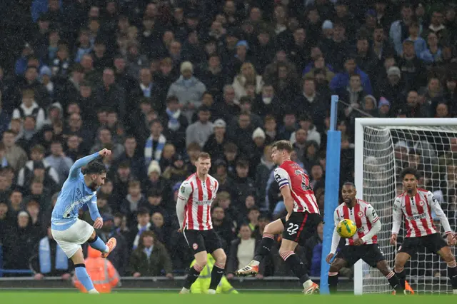 Rayan Cherki shoots to score