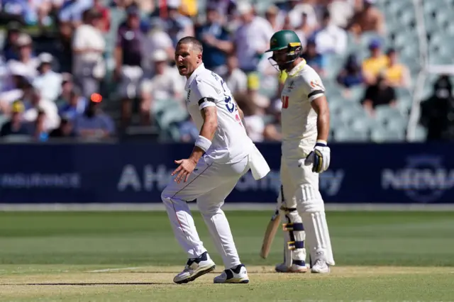 England’s Brydon Carse (left) appeals for LBW against Australia's Jake Weatherald (right) on day one of the third NRMA Insurance Ashes Series 2025 test at the Adelaide Oval, Australia