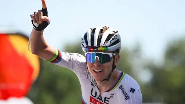 Tadej Pogacar celebrates at the Tour de France