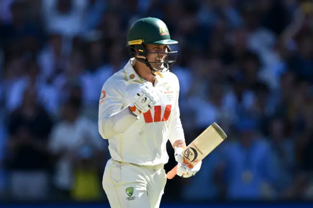 Australia's Alex Carey celebrates his century