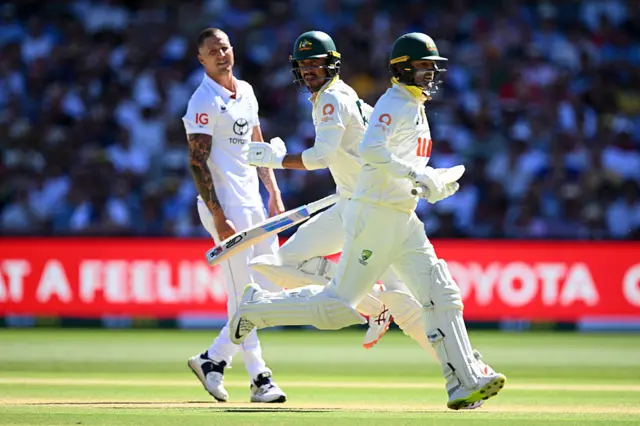 Mitchell Starc of Australia scores a run off the bowling of Brydon Carse of England during day two of the Third Test Match in the 2025-26 Ashes Series between Australia and England at Adelaide Oval