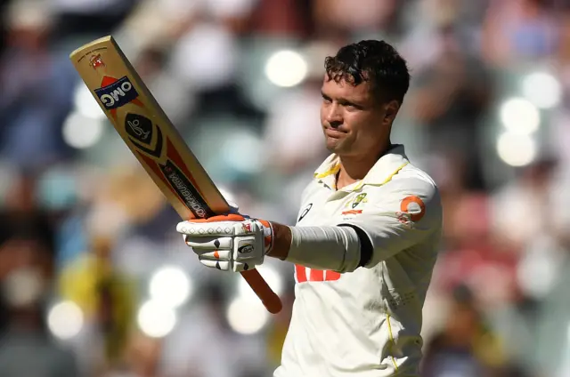 Alex Carey celebrates his century