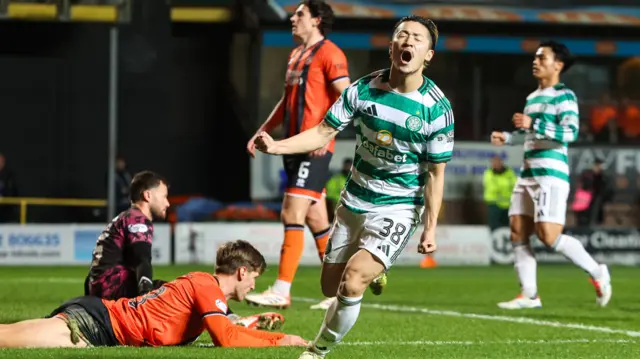 Daizen Maeda scores for Celtic at Dundee Utd
