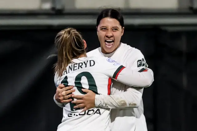 Sam Kerr (R) of Chelsea celebrates with teammate Johanna Rytting Kaneryd (L) after scoring