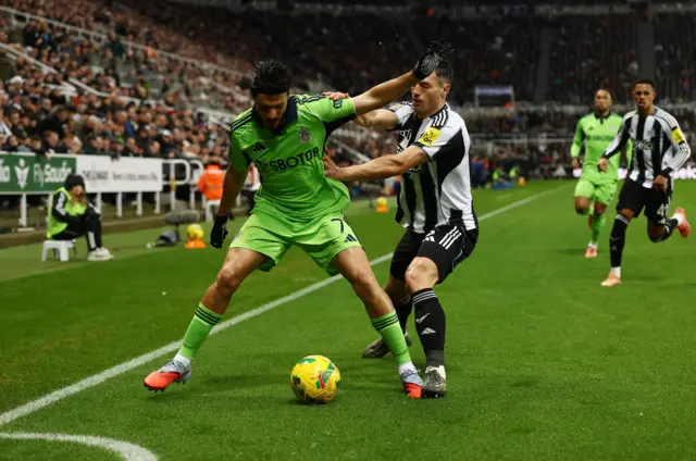 Fulham's Raul Jimenez in action with Newcastle United's Fabian Schar