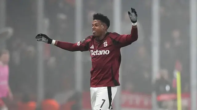 John Mercado celebrates