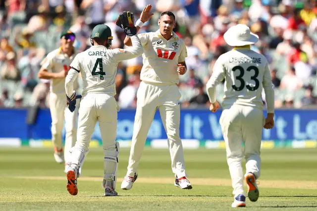 Scott Boland celebrates the wicket of Brydon Carse