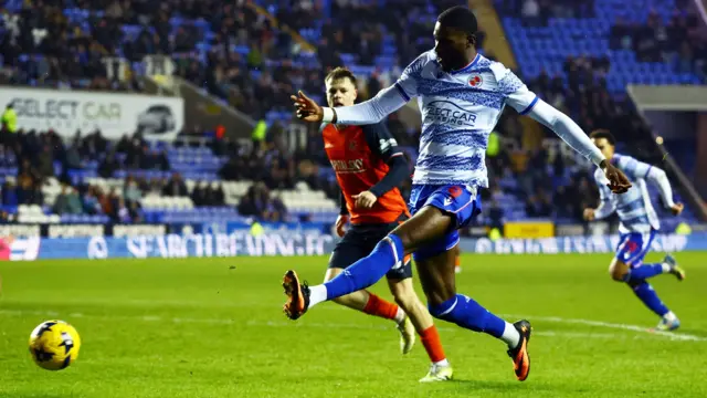 Kelvin Ehibhatiomhan scores Reading's third against Luton