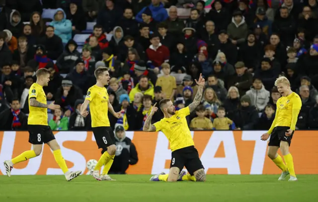 KuPS' Piotr Parzyszek celebrates scoring their first goal with teammates during UEFA Conference League - Crystal Palace v KuPS.