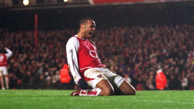 Thierry Henry celebrates scoring for Arsenal