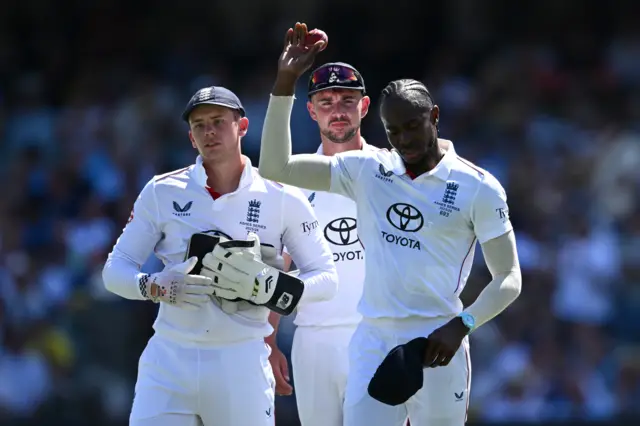Jofra Archer raises the ball after completing his five-wicket haul