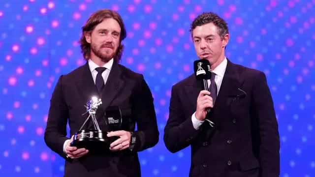 Rory McIlroy and Tommy Fleetwood after receiving the award for Team of the Year during the 2025 BBC Sports Personality of the Year Awards