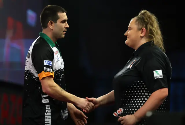 William O'Connor shakes hands with Beau Greaves