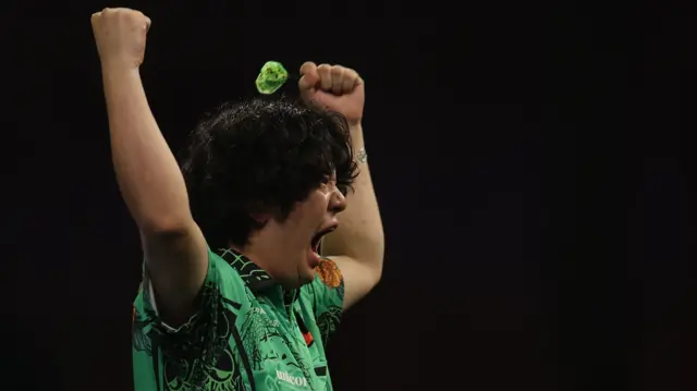 Motomu Sakai celebrates